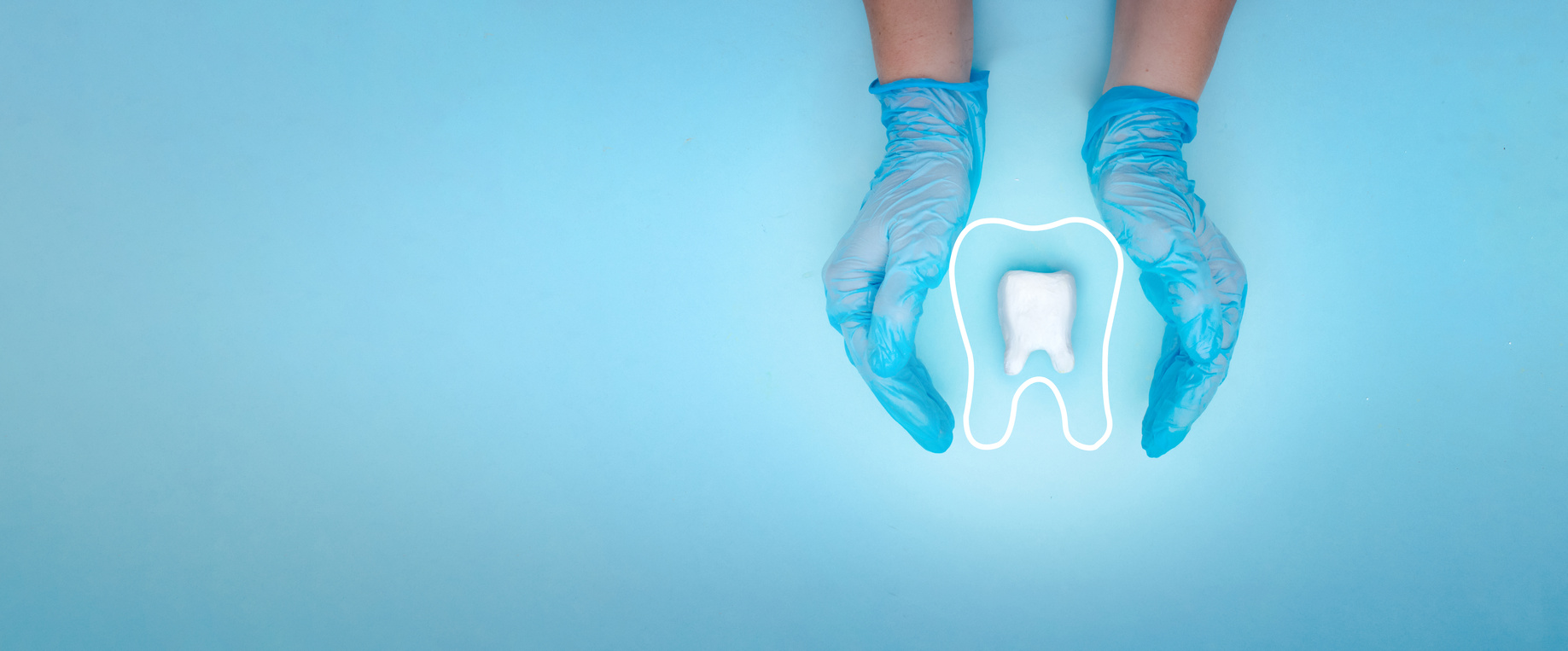 Female dentist hand in blue medical gloves holds tooth molar and Thin linear outline icon. Tooth symbol sign.